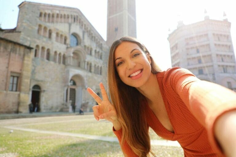 Tourist selfie in Piazza Duomo Square Parma, Italy
